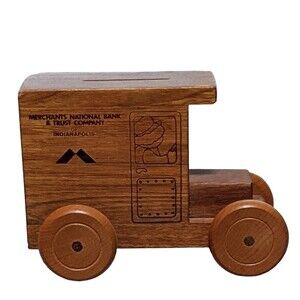 Vintage wooden truck bank advertisement bank